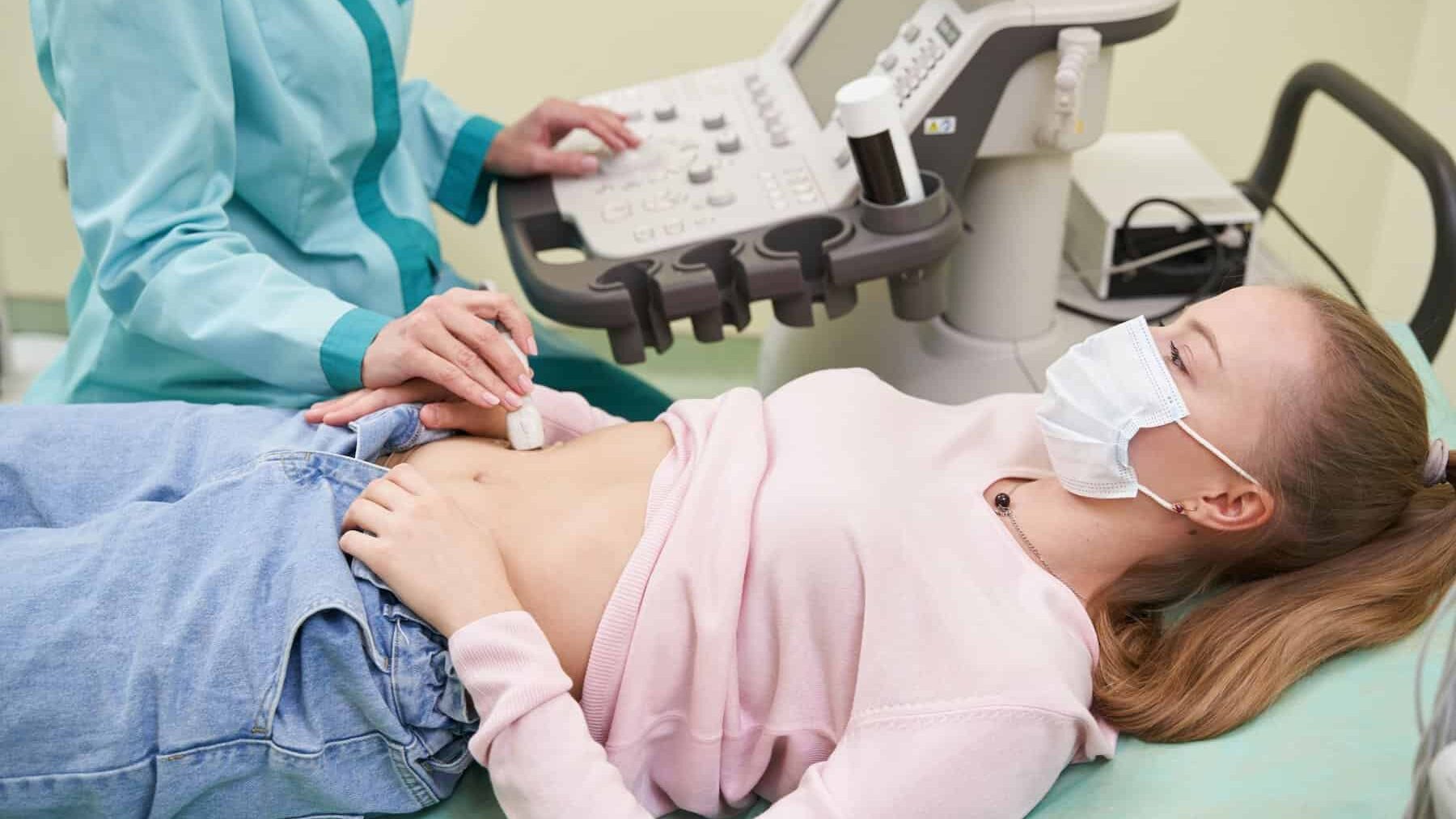 Young female person doing ultrasound health examination